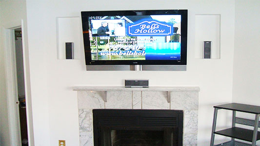 drywall tv installation above mantel