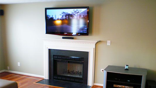 above the fireplace tv installation on drywall 10