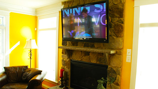 over the fireplace tv installation on stone 2
