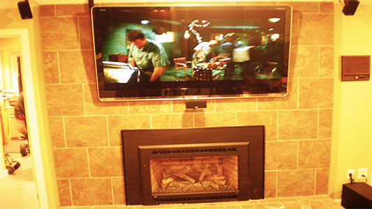 above the fireplace tv installation on brick 10